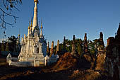 Inle Lake Myanmar. Indein, on the summit of a hill the  Shwe Inn Thein Paya a cluster of hundreds of ancient stupas. Many of them are ruined and overgrown with bushes. 